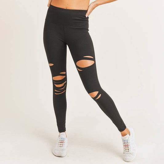 Laser cut leggings with high waist and breathable cut-out detailing, designed for workouts and sporty everyday wear